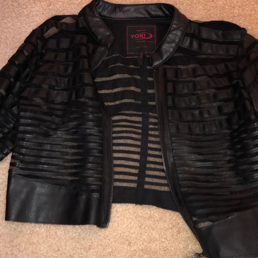 A black cropped jacket
